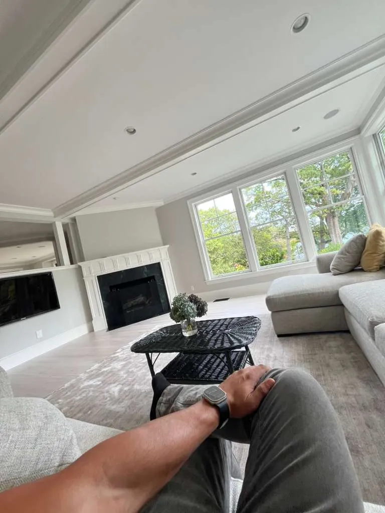 Luxury living room with coffered ceiling and white trim painting in Cambridge MA